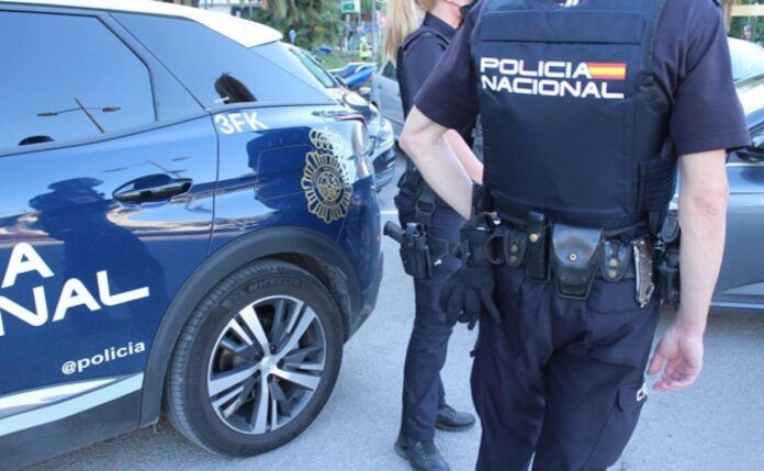 policia nacional espalda