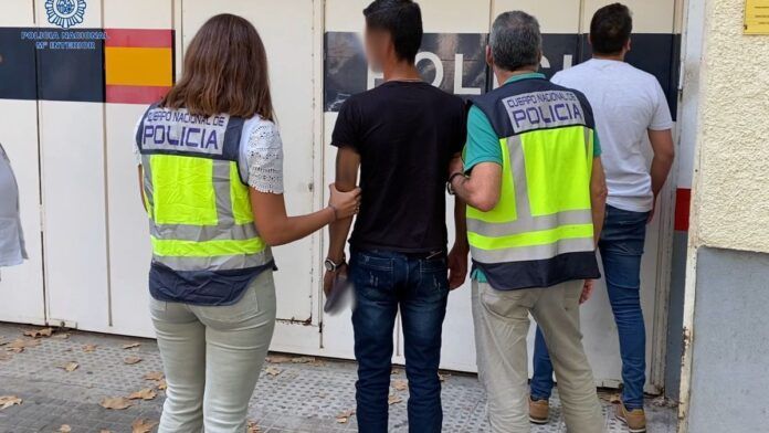 policia hombre detenido